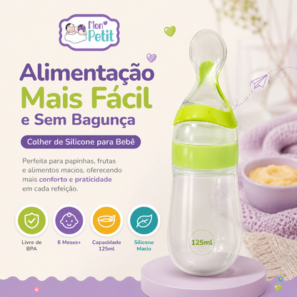 Infográfico publicitário da Colher de Silicone para Bebé Mon Petit pousada num pódio lilás, exibindo a capacidade de 125ml e os selos indicativos de uso a partir dos 6 meses.