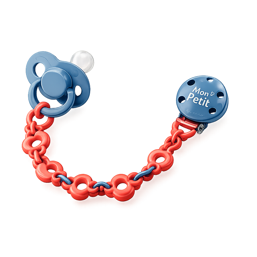 Corrente de chupeta Mon Petit em silicone flexível azul e coral ligada a uma chupeta azul sobre um fundo branco isolado.